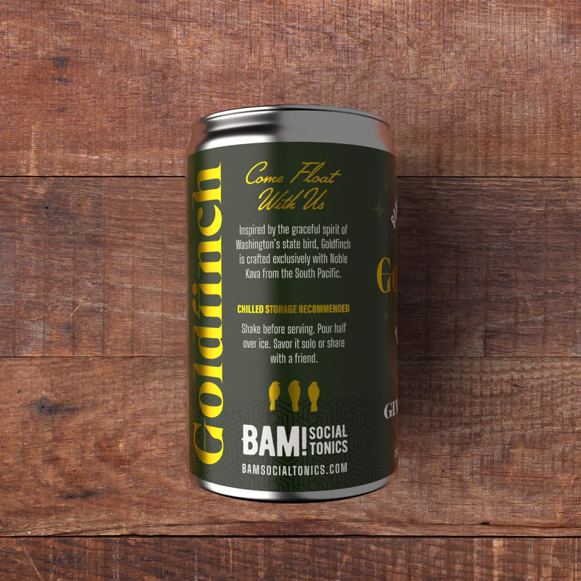 Side of a single can of Goldfinch Ginger Kava — a non-alcoholic adult beverage to relax and unwind, by BAM! Social Tonics. The label shows serving instructions: shake before serving, pour half over ice, savor solo or share with a friend.