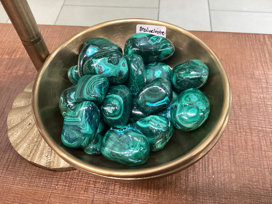 Assorted loose sea green Malachite stones.