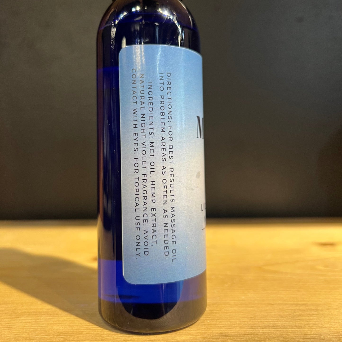 Luxurious and Hemp-CBD Massage Oil for Soft, Hydrated Skin. Contains no THC. Night Violet scented, coconut oil based.
